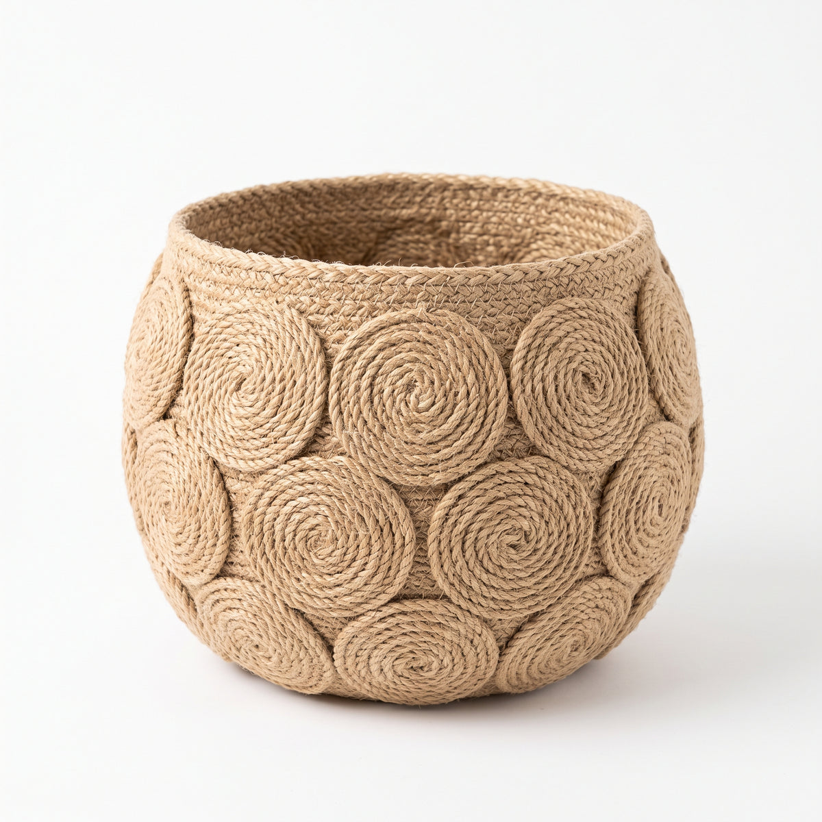 Handwoven jute rope spiral planter basket, front view on a white background